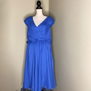 Blue flowing evening dress.